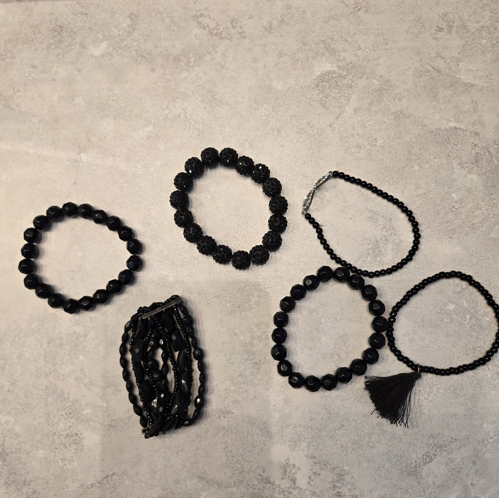 6 beautiful black beaded stretch bracelets.